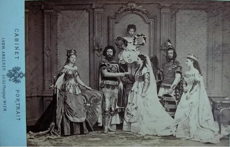 A royal tableaux vivant from the late 1860s including royal figures standing looking at the camera.