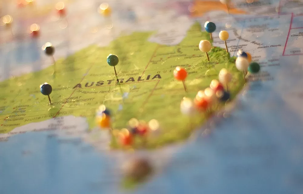 A map of Australia with pushpins in different locations.