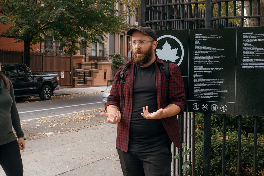 Keith Tailion talking to a tour group in New York City.